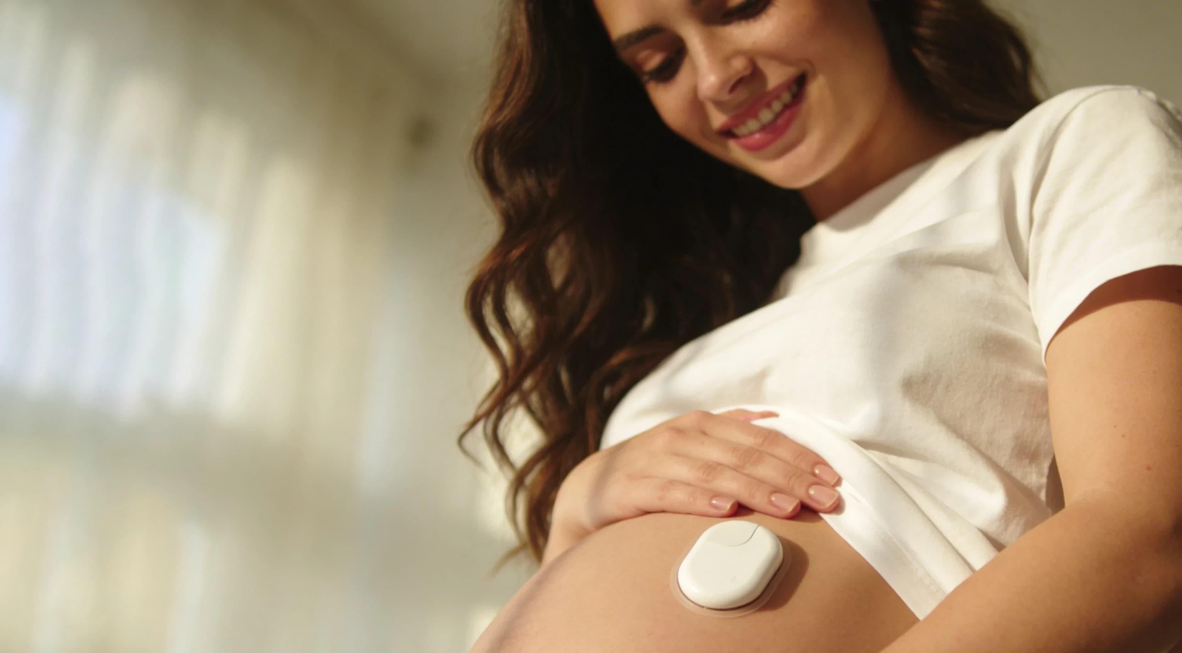 Pregnant woman using Numa pump